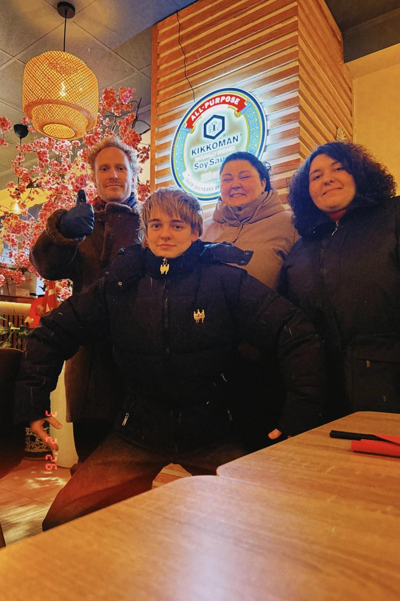 A group photo of three female staff members from the NGO Resistance and a representative from LGBT+ Denmark